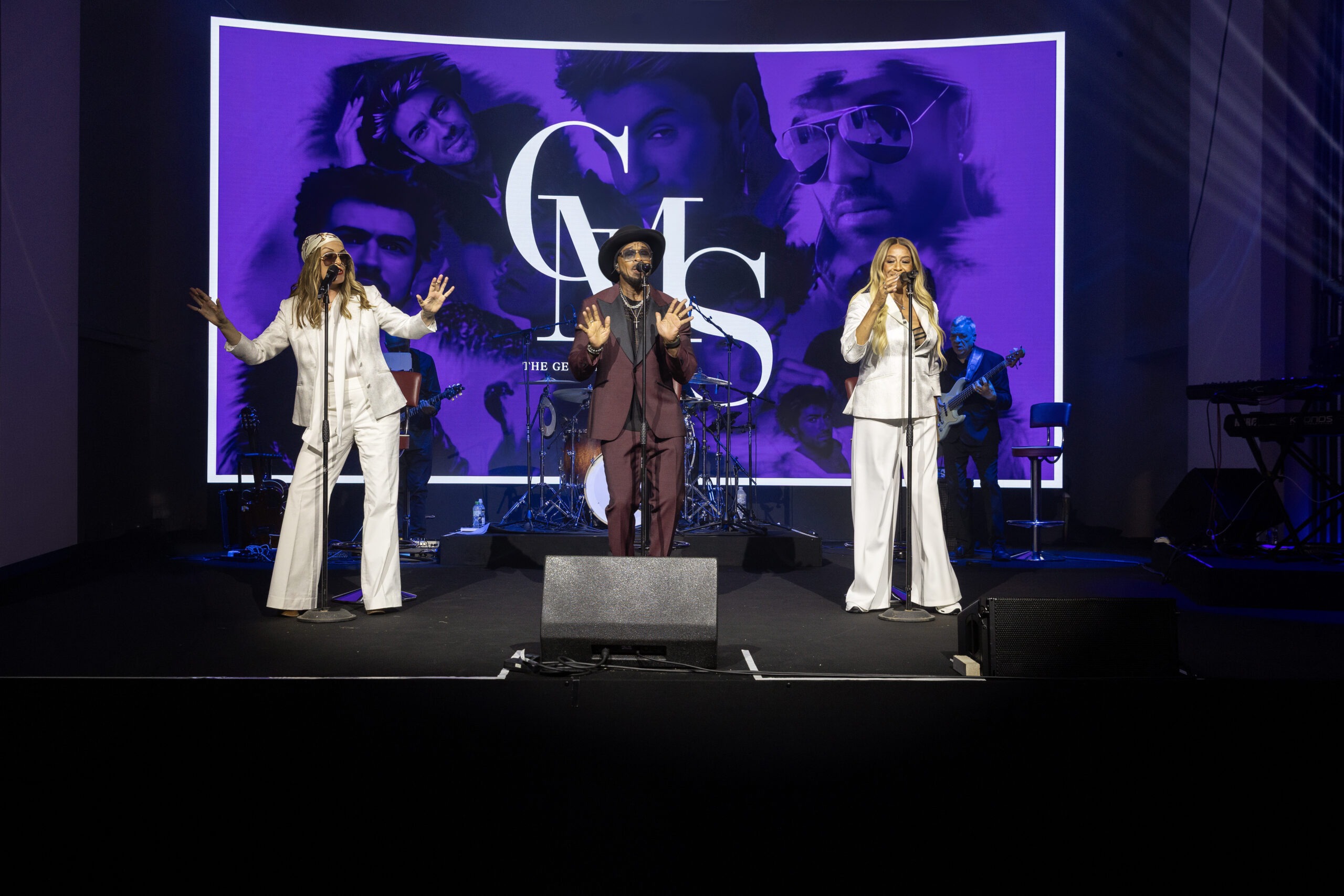 Vibrant concert lighting and LED screens at The George Michael Singers Live, produced by Kudos AV