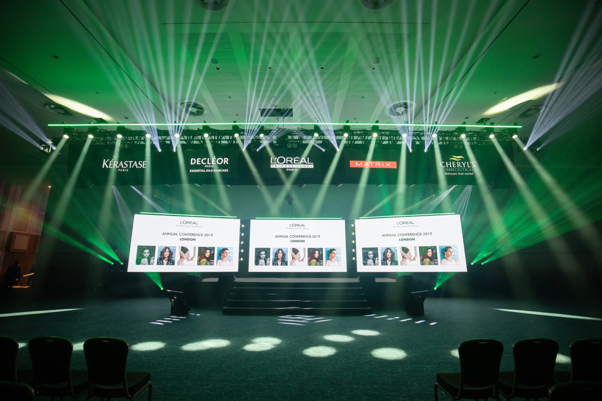 Corporate product launch event by Kudos AV with large LED walls and immersive lighting, illustrating the top UK event production trends for 2026